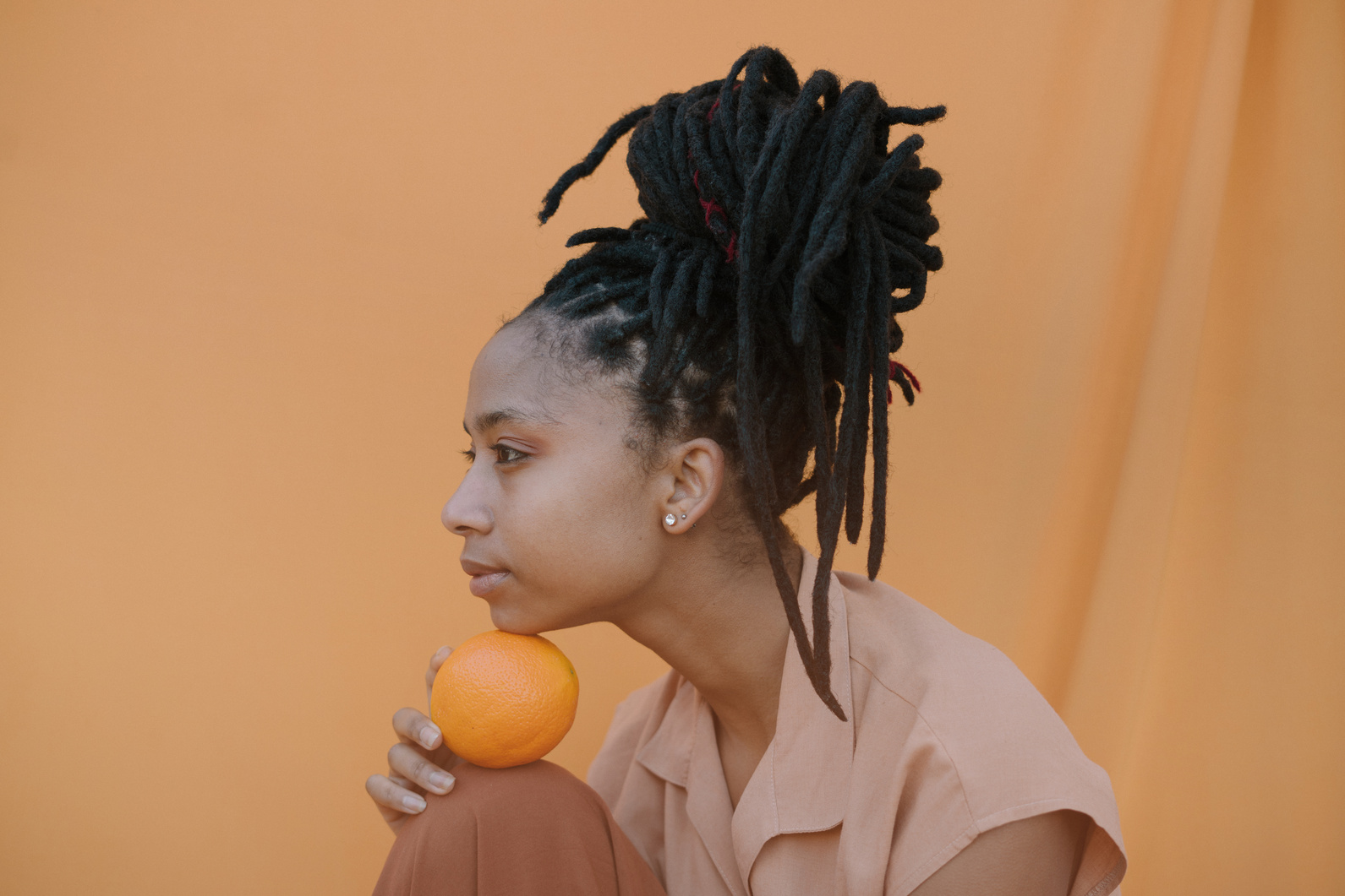 Woman with an Orange 