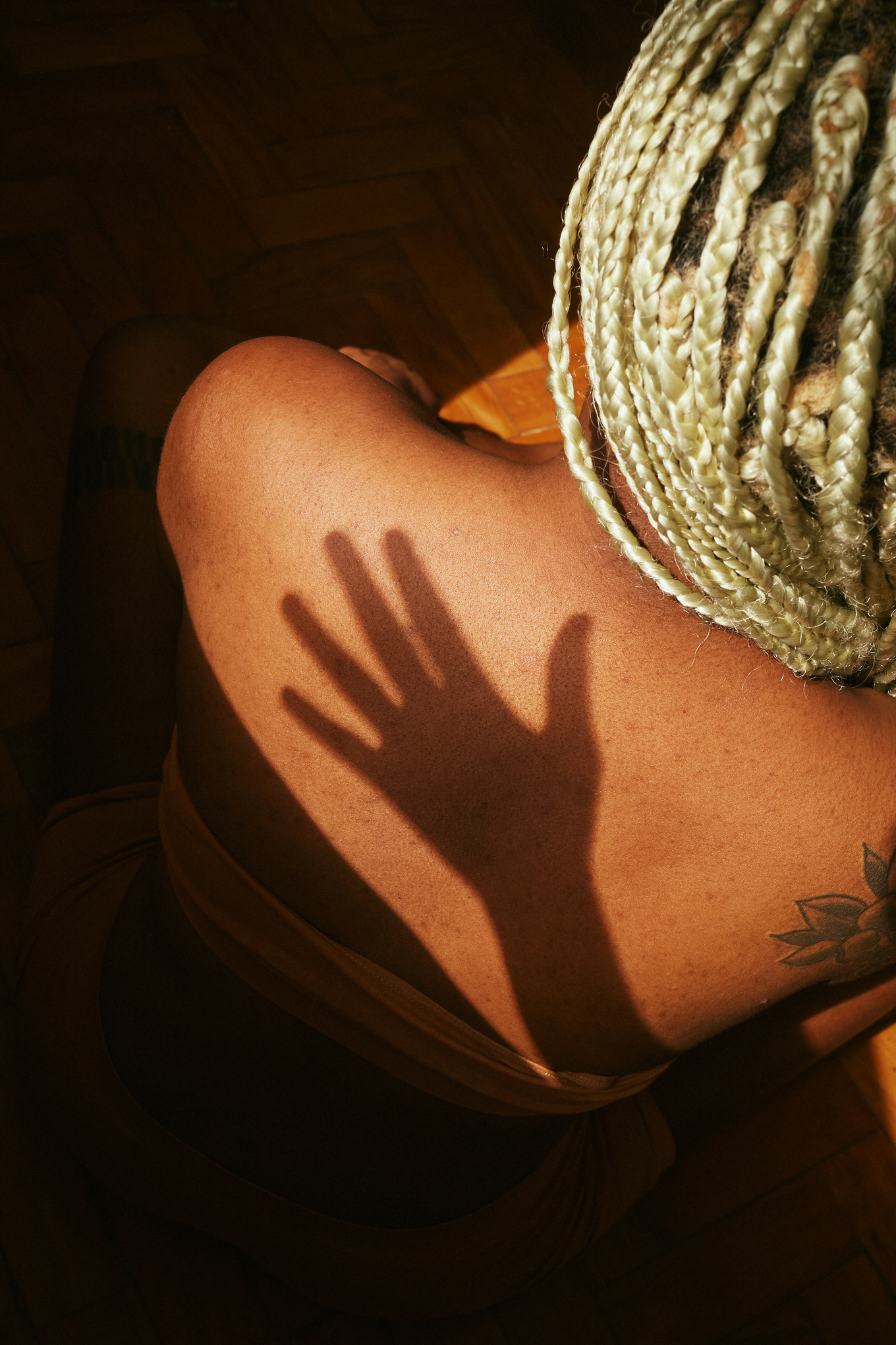 Back of Woman with Shadow of a Hand